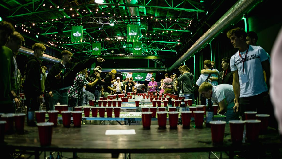 Ongoing gameplay at an ERDINGER Brauhaus beer pong tournament.