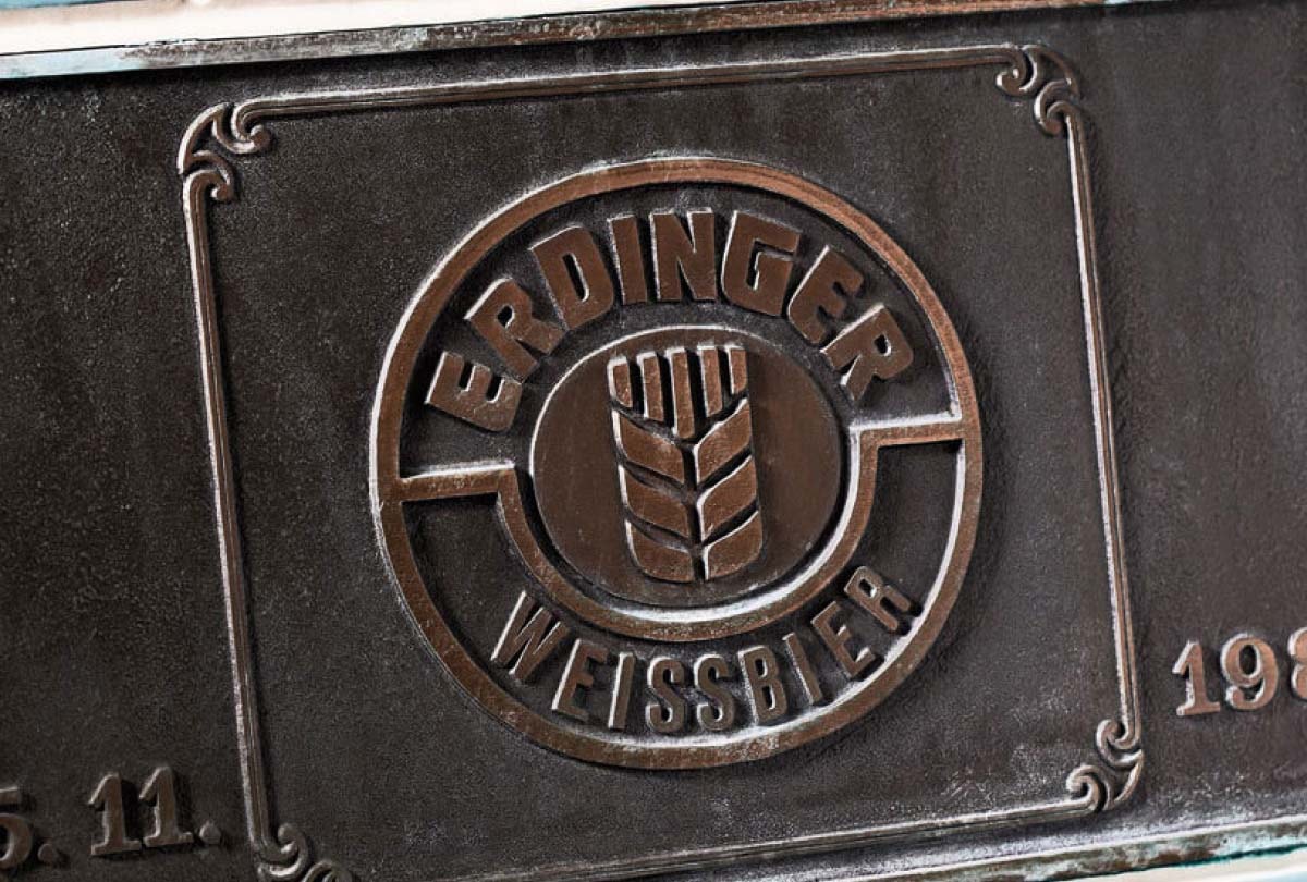 Close-up of a plaque with the ERDINGER emblem in the filter cellar.